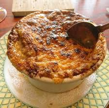 Le Bouchon signature dishes French Onion Soup
Rabbit Pot Pie
Steak Frites